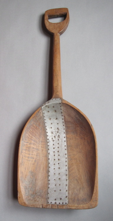 repaired wooden scoop