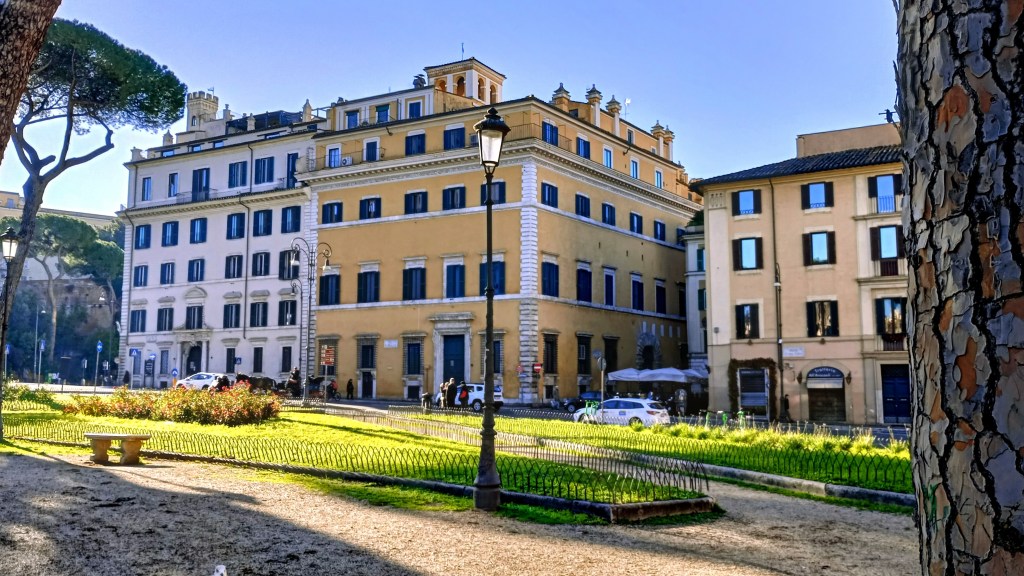 fotos of three buildings facing piazza d'aracoeli