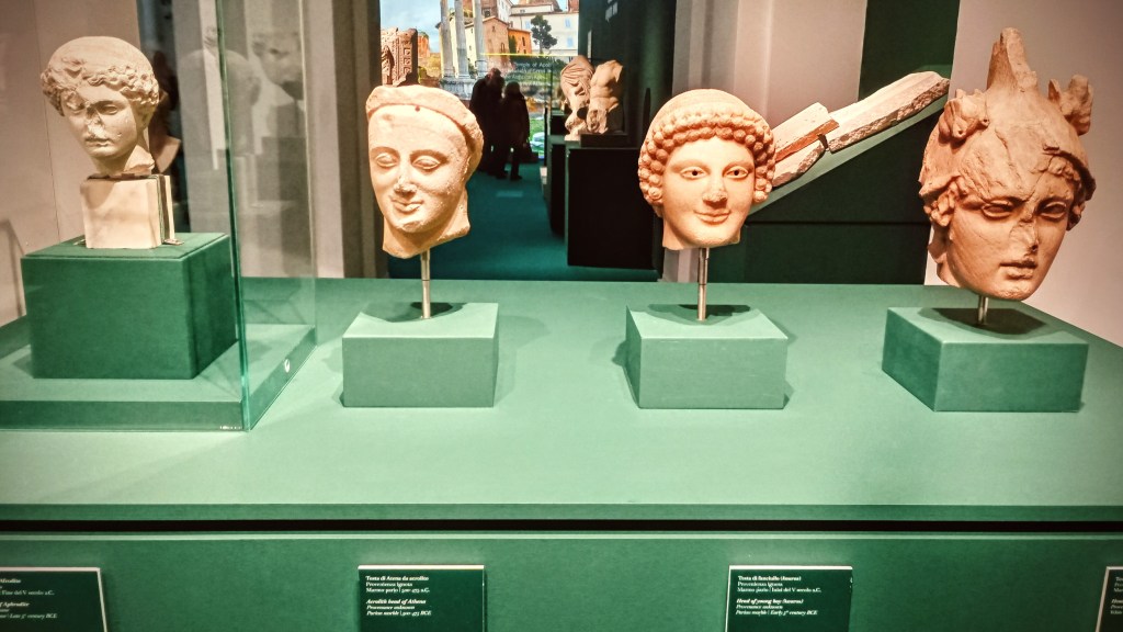 a row of terracotta heads