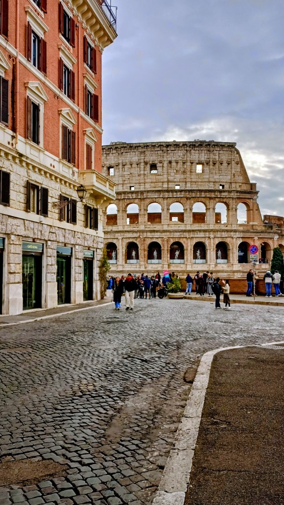 the colosseum at the end of the street