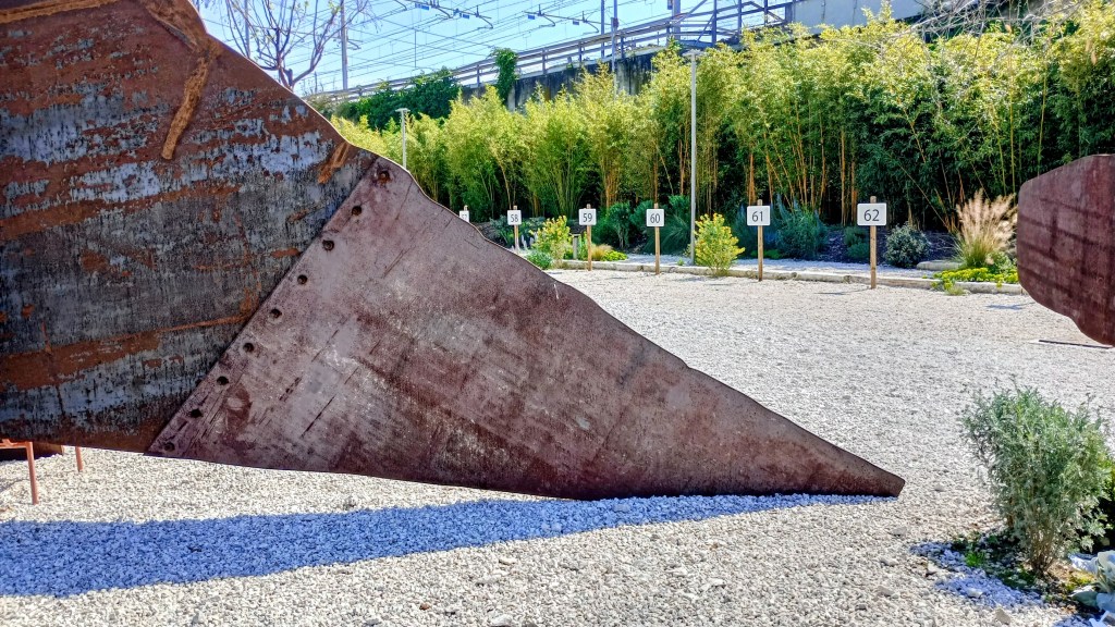 photo of the metal dinosaur's tail