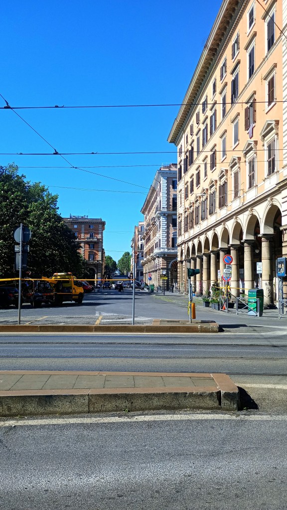 photo of Piazza Vittorio with view of portico columns and view of the street