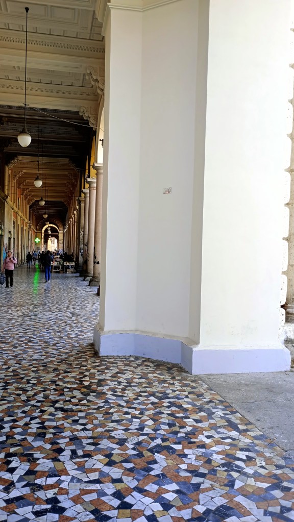 photo of Piazza Vittorio, view of the mosaics under the portico